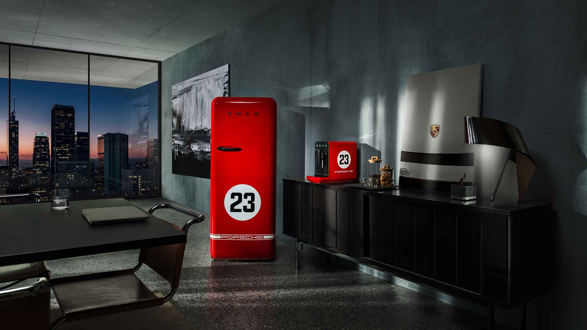 Modern interior with a red FAB28 refrigerator featuring the number 23, a TV, and cityscape view.