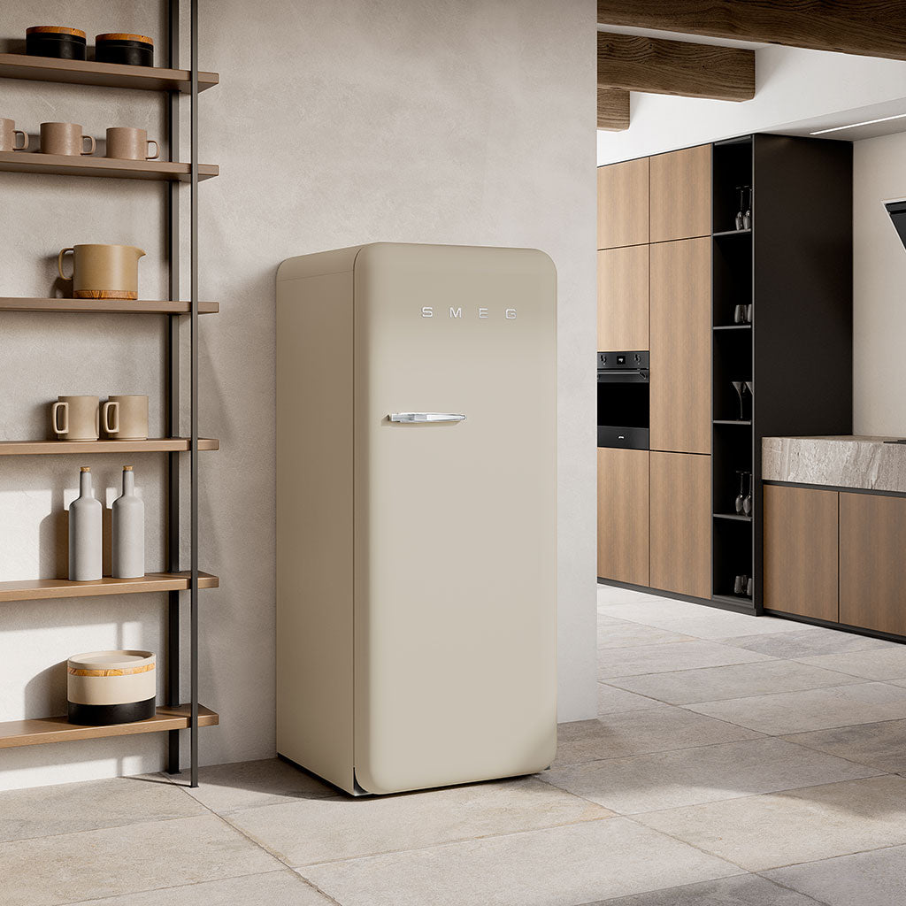 Perfectly pale refrigerator with Smeg logo in a modern kitchen setting