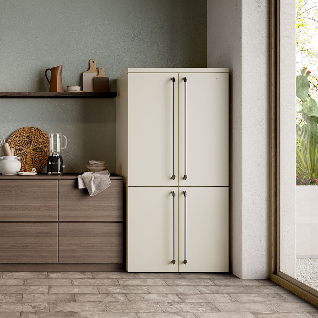 Cream fridge freezer with wooden drawers in a modern kitchen setting.