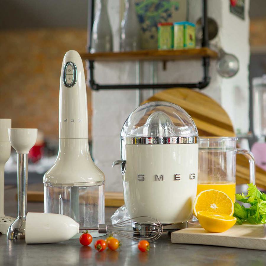 Kitchen scene with Smeg appliances and ingredients on a countertop